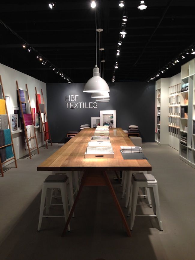 Showroom interior design Chennai — material display gallery with track lighting